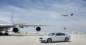 a car and a plane in the sky
