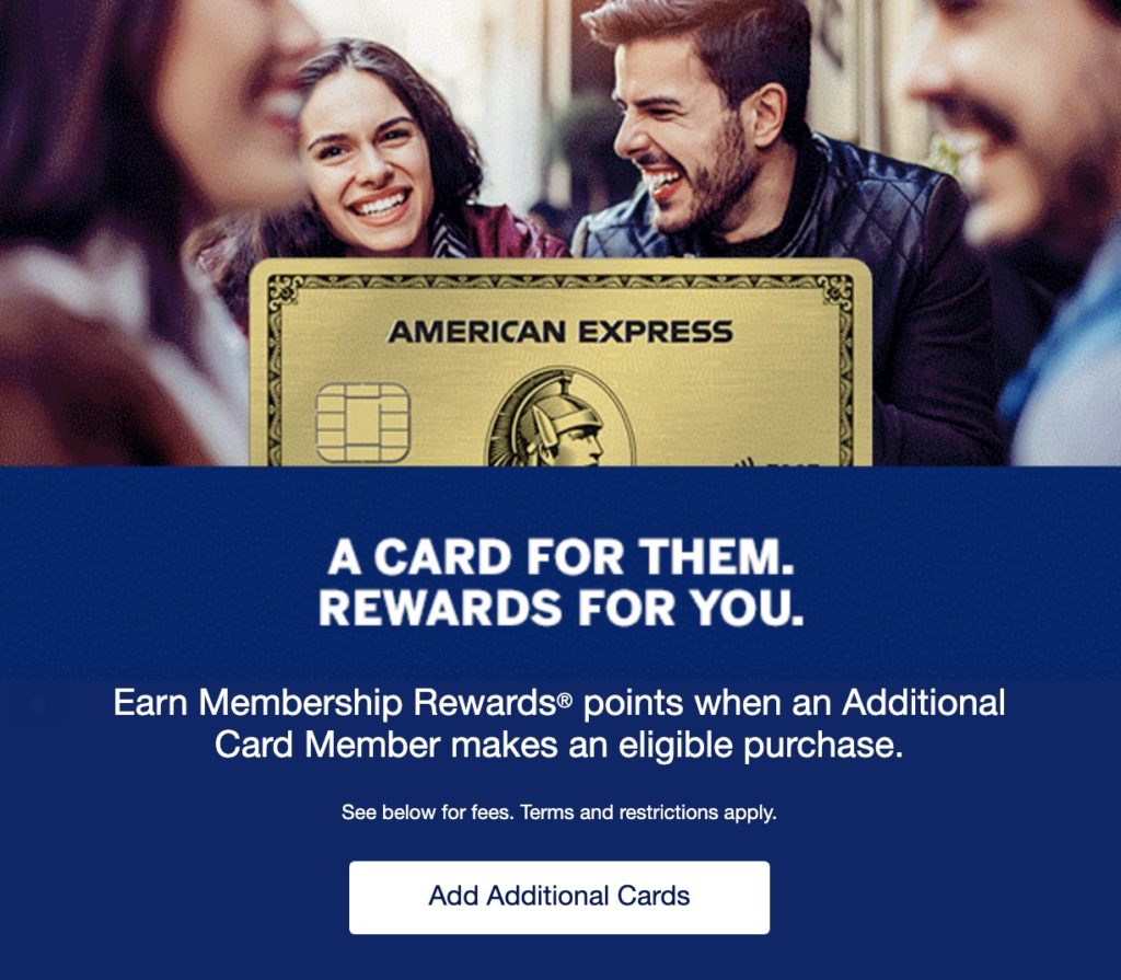 a group of people smiling and holding a credit card