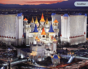 a large white castle with colorful towers with Excalibur Hotel and Casino in the background