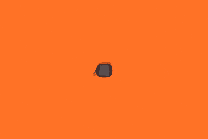 a black object on an orange background