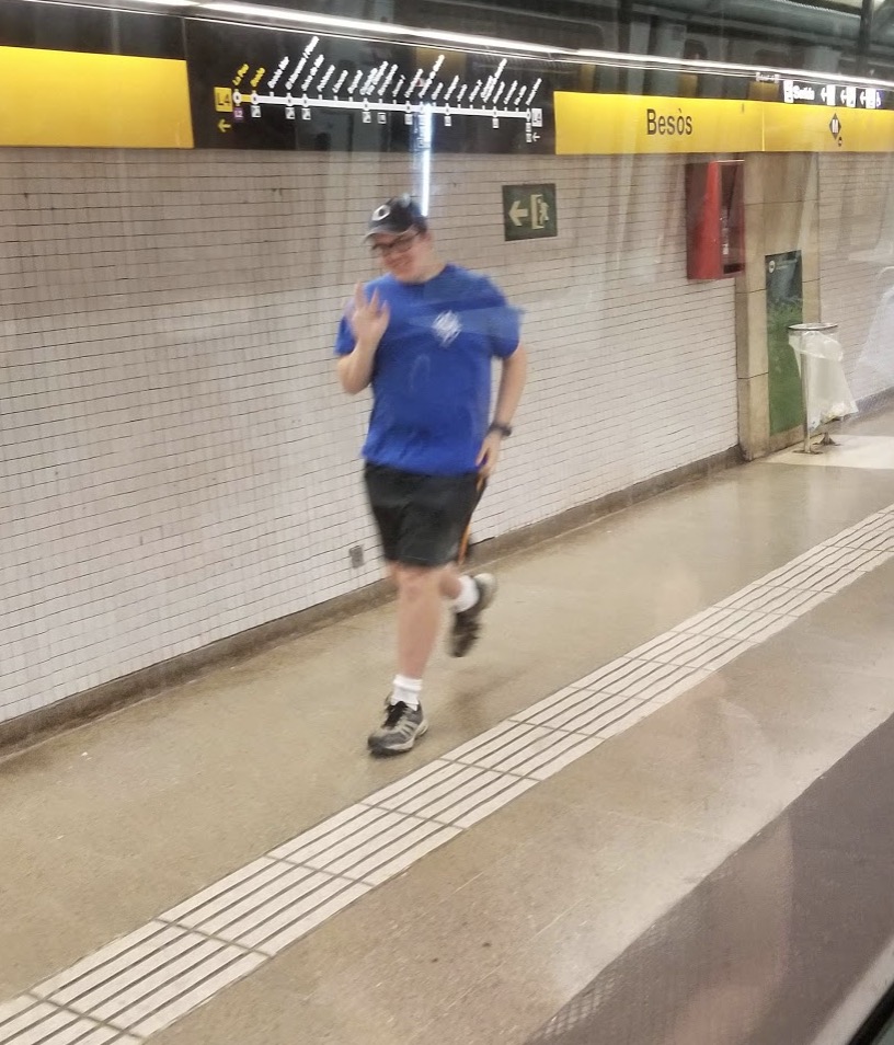 a man running in a subway