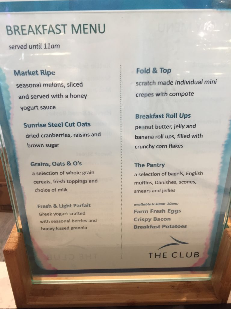 a menu on a glass stand