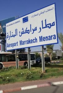 a large sign with blue text and white text