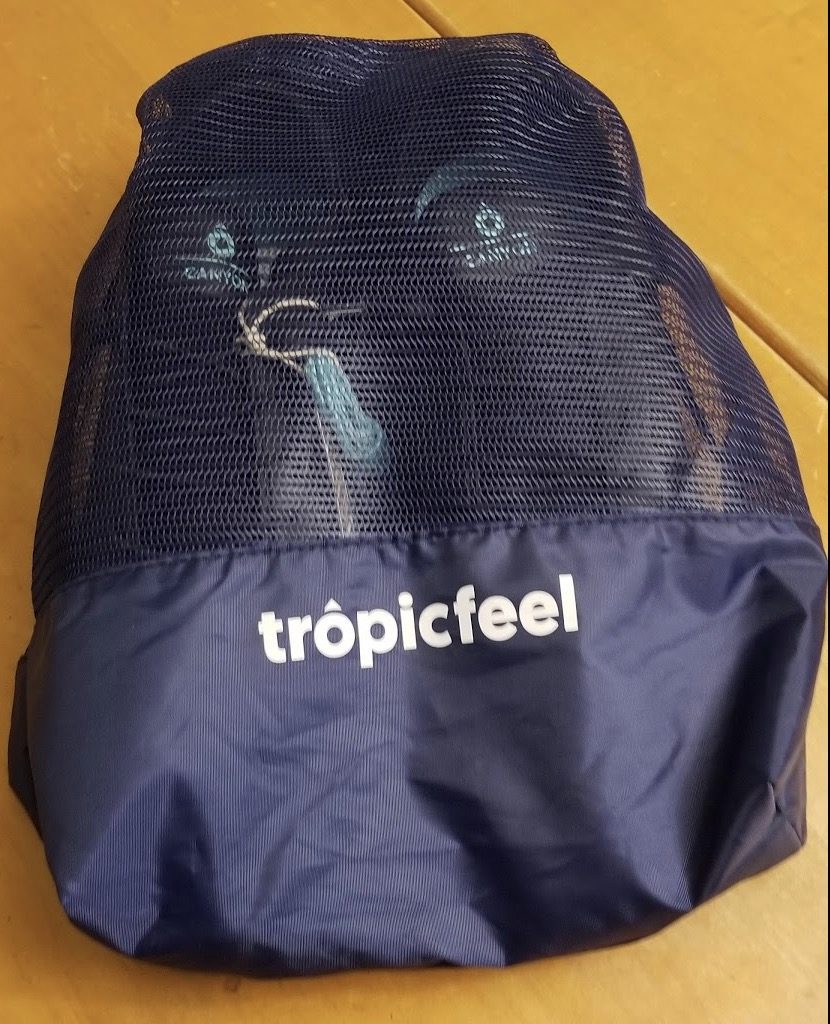 a blue bag with white text on it