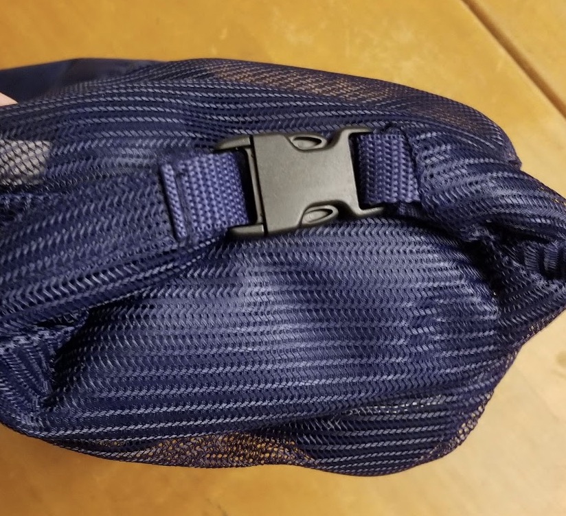 a blue bag with a black zipper