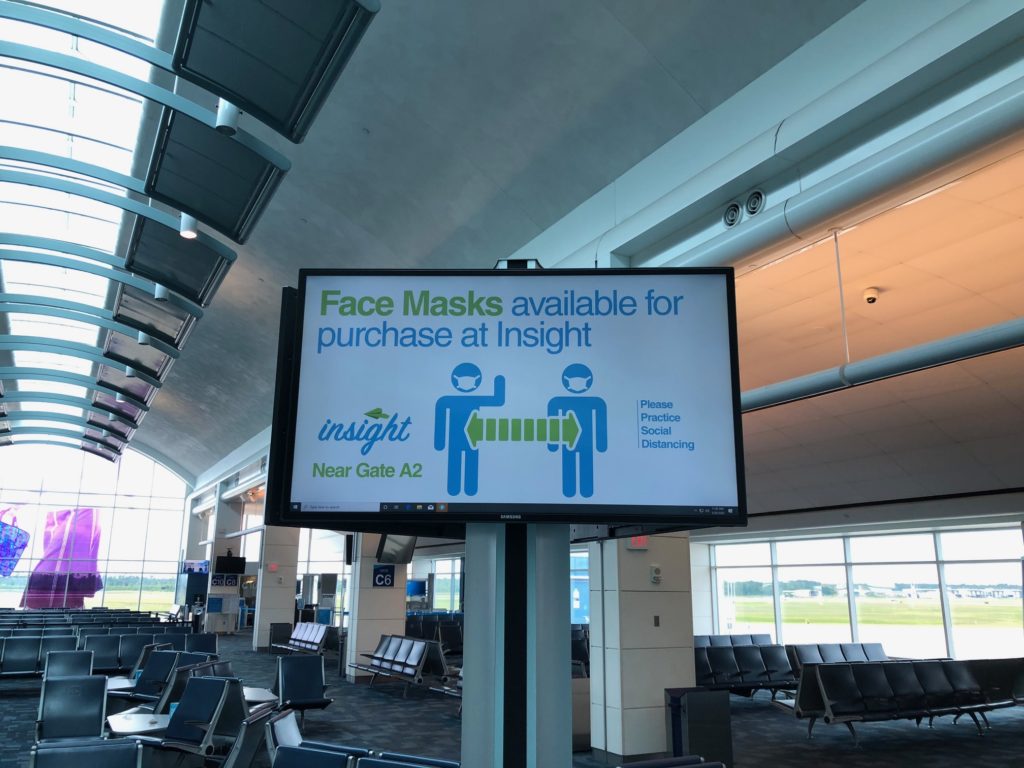 a sign in an airport terminal