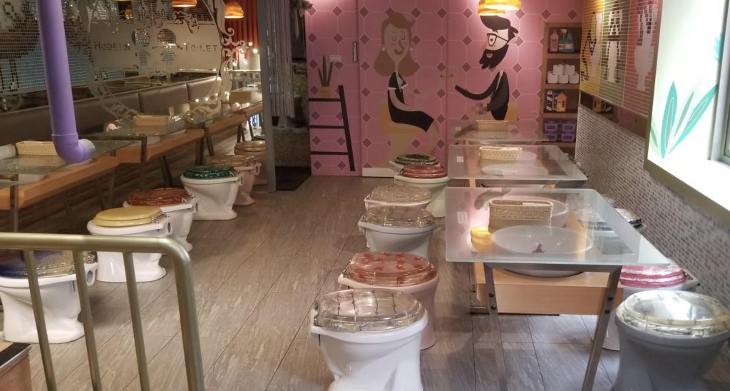a store with toilets and shelves