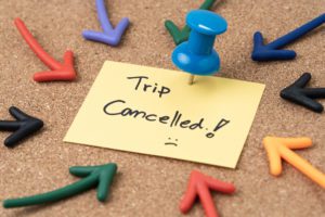 A sticky note says trip cancelled.