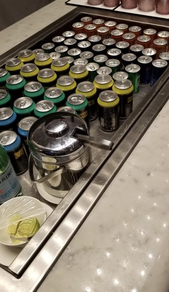 a group of cans and a container on a counter