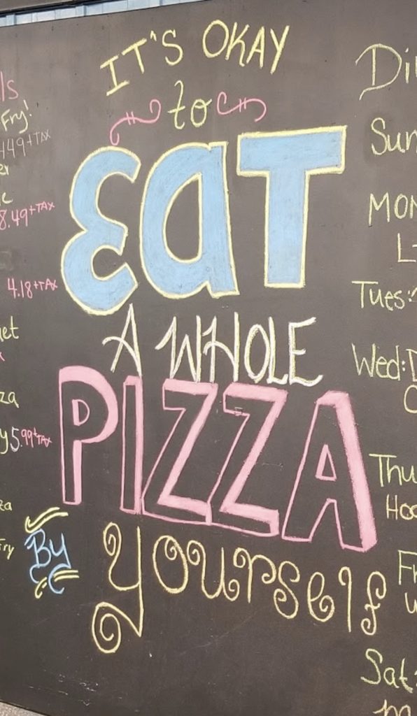a chalkboard with text on it