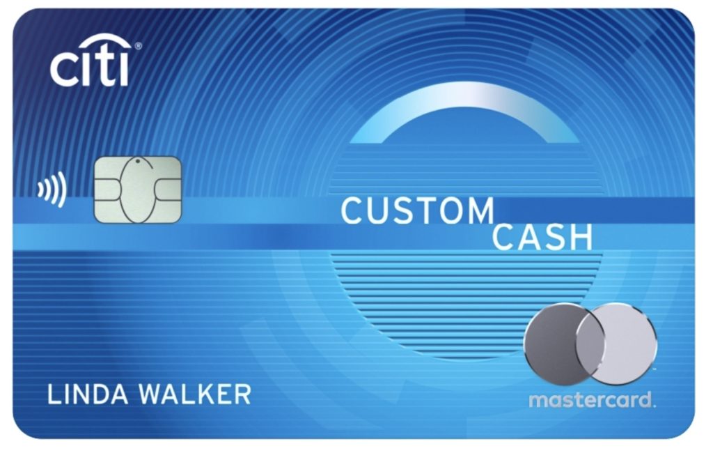 a blue credit card with silver coins