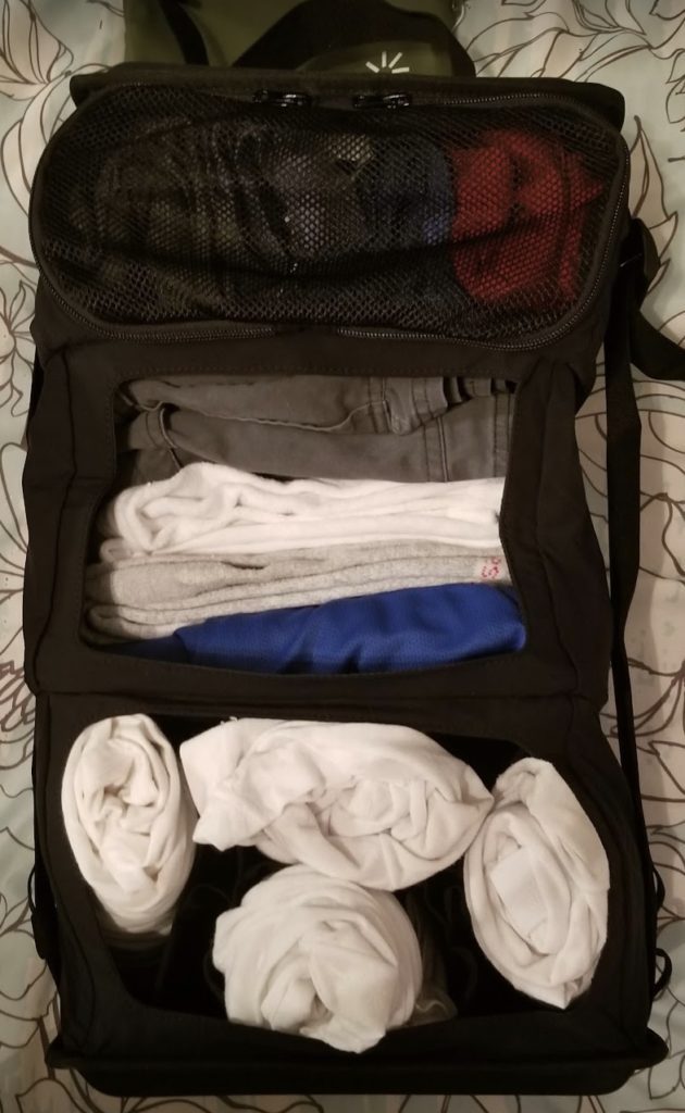 a bag with folded clothes