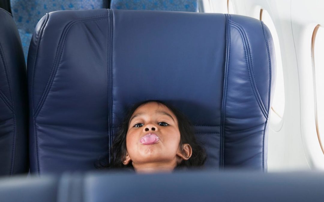 Help! I’m Stuck Next to Someone Else’s Kid on an Airplane