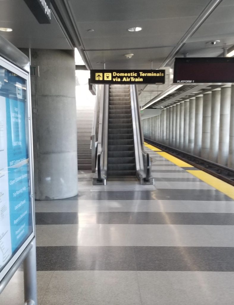 a escalator in a train station