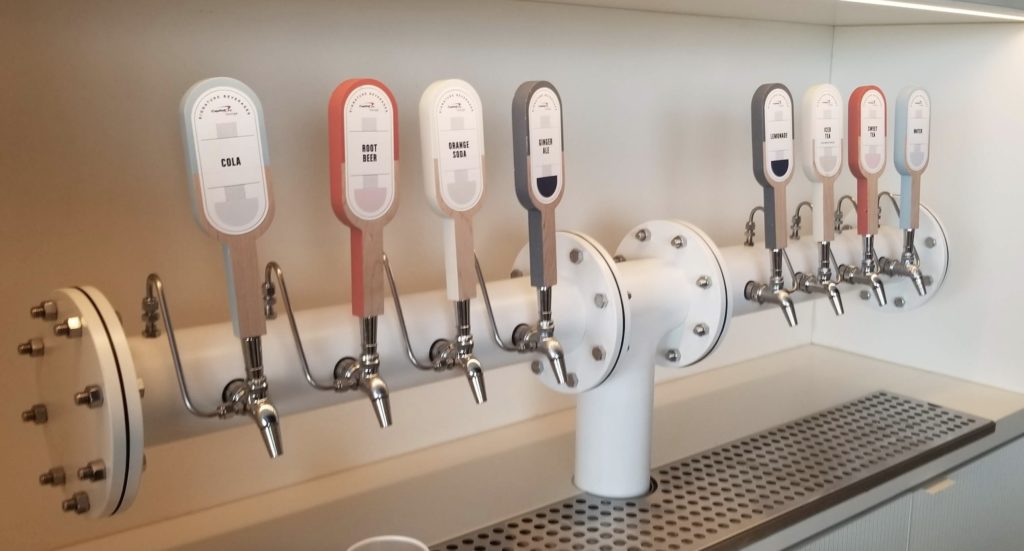 a row of taps on a wall