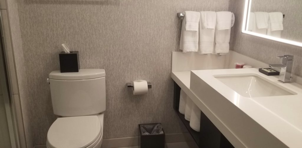 a bathroom with white towels