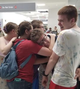 a group of people hugging