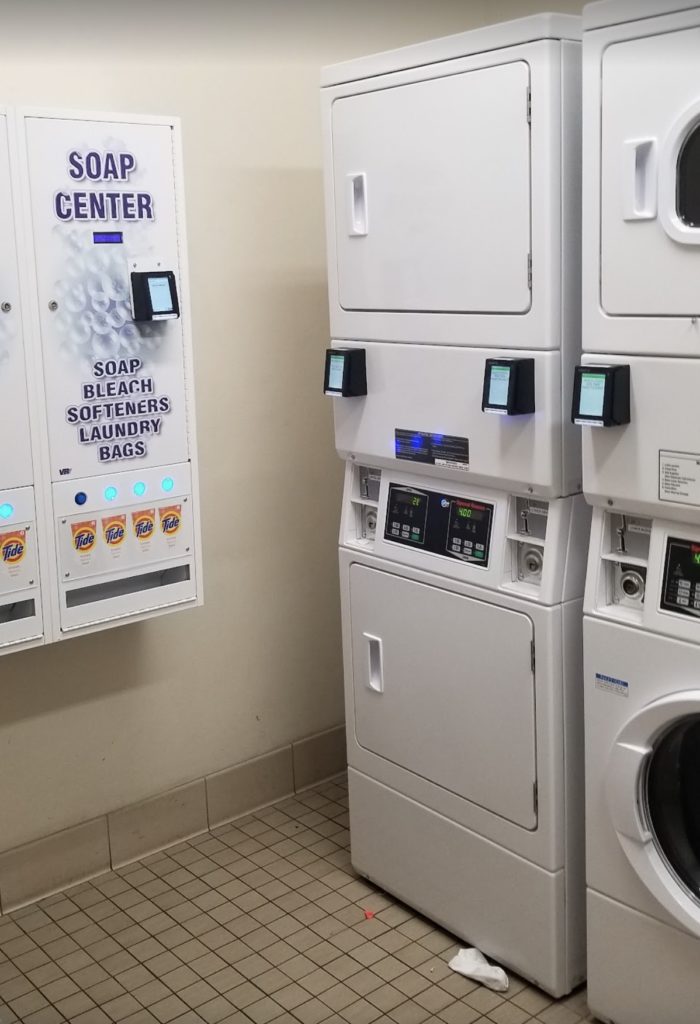 a group of white laundry machines