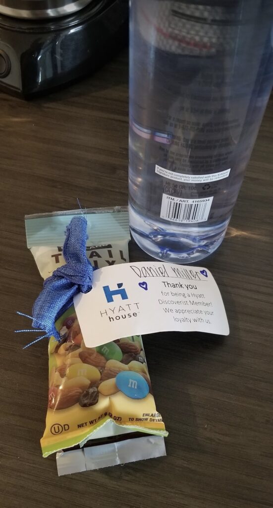 a bottle of water and a package of candy