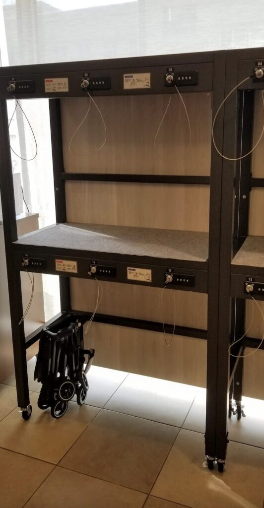 a shelf with wires and a few switches