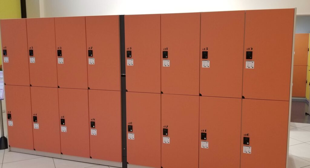 a row of orange lockers
