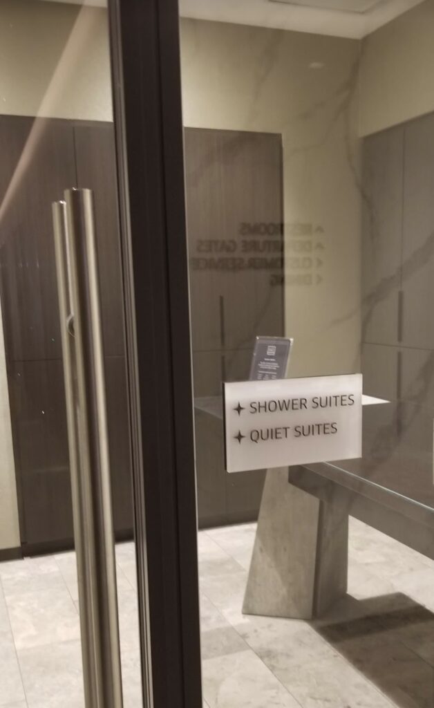 a glass door with a sign on it