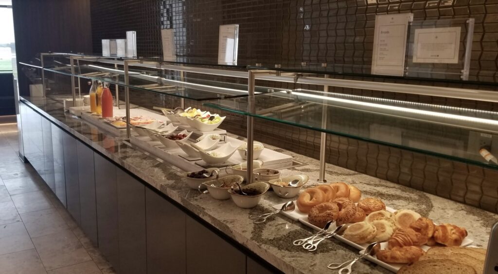 a buffet line with food on it