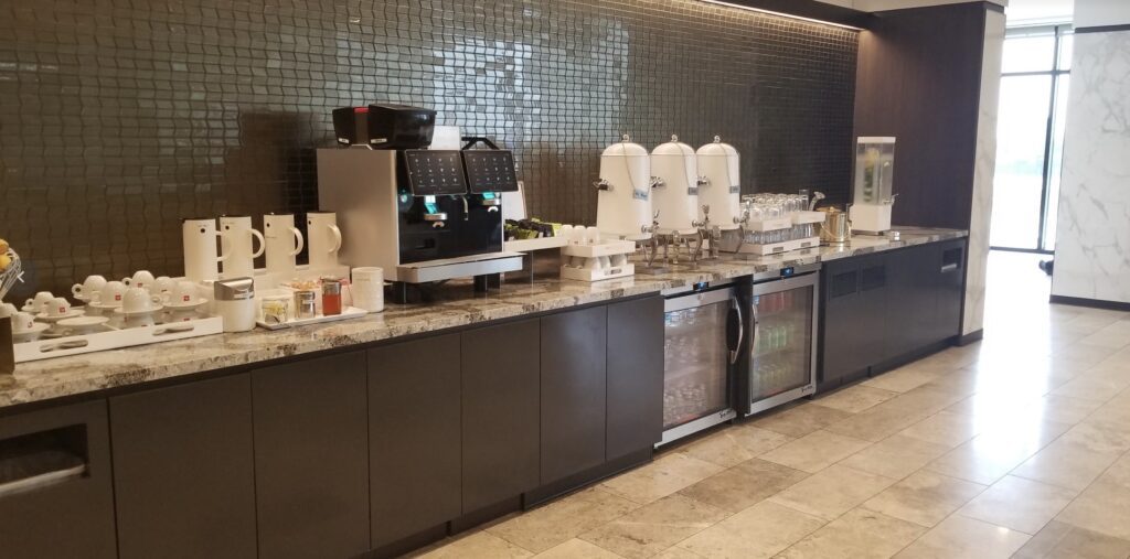 a coffee machine and beverage dispensers in a restaurant