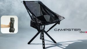 a black folding chair with a mesh cover