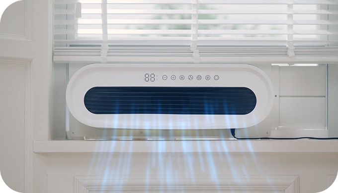 a air conditioner with a light coming out of it
