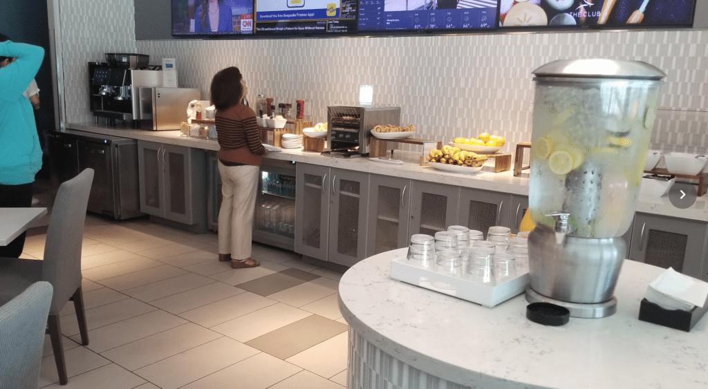 a woman standing at a counter