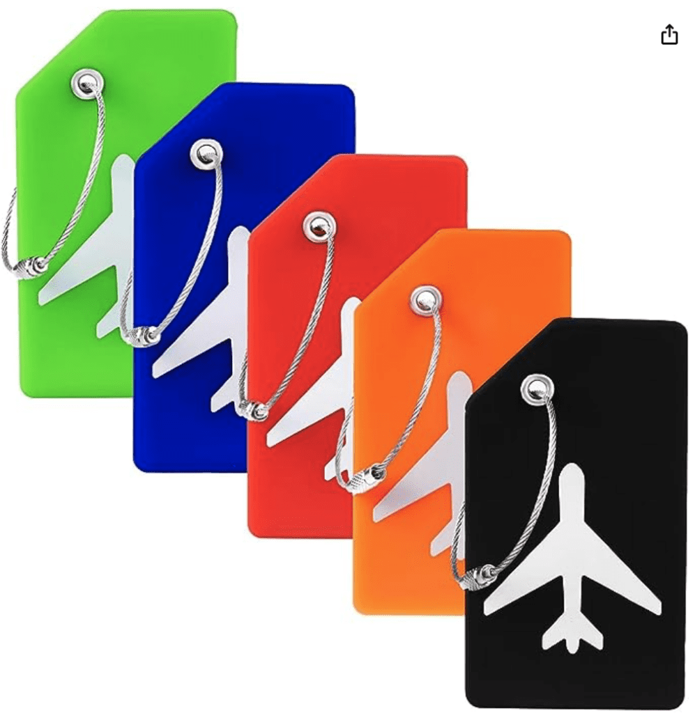 a group of colorful luggage tags