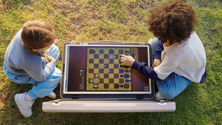 a group of kids playing chess