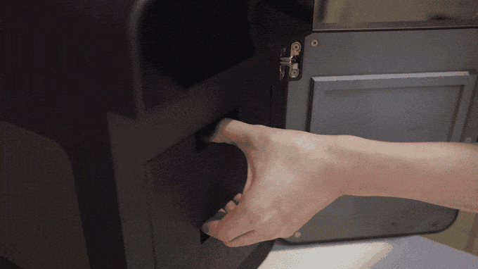 a person's foot in a mailbox