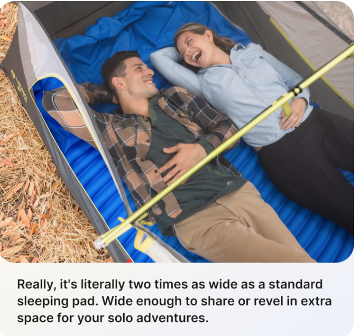 a man and woman lying in a tent