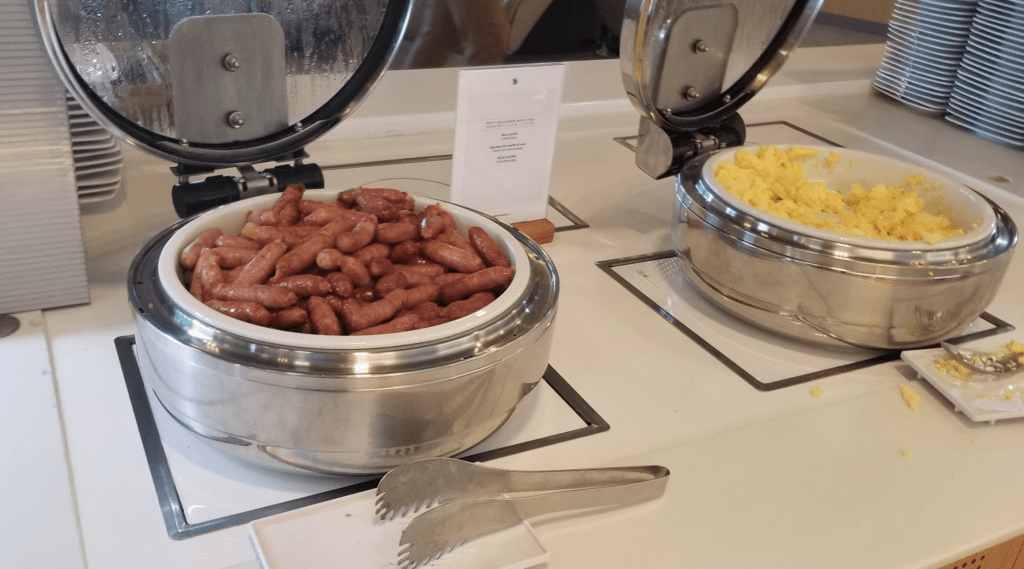 a bowl of sausages and scrambled eggs