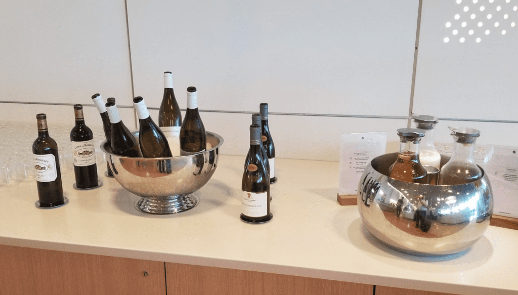 a group of bottles in a bowl