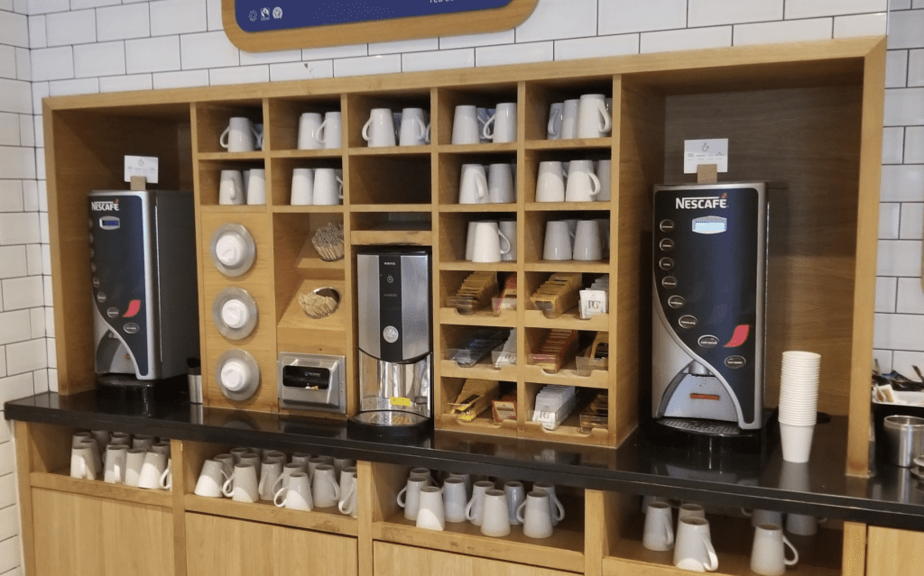 a coffee machine and coffee maker in a coffee shop