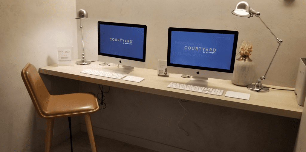 two computers on a desk