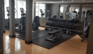 a gym with weights and exercise equipment