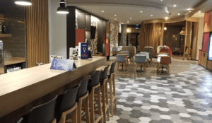 a room with chairs and tables