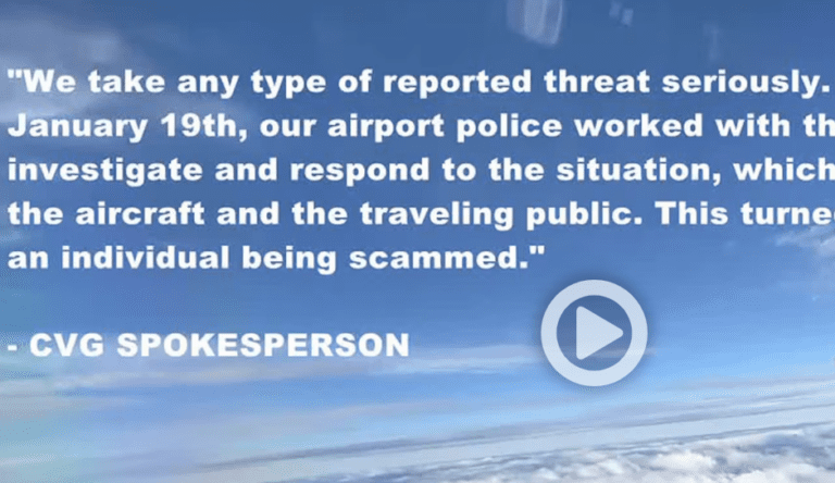 a blue sky with clouds and a person in the background