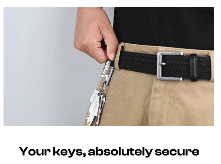 a person holding a belt with keys