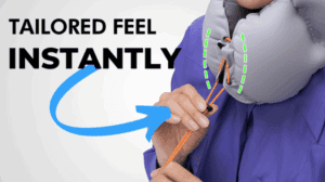 a person holding a grey vest