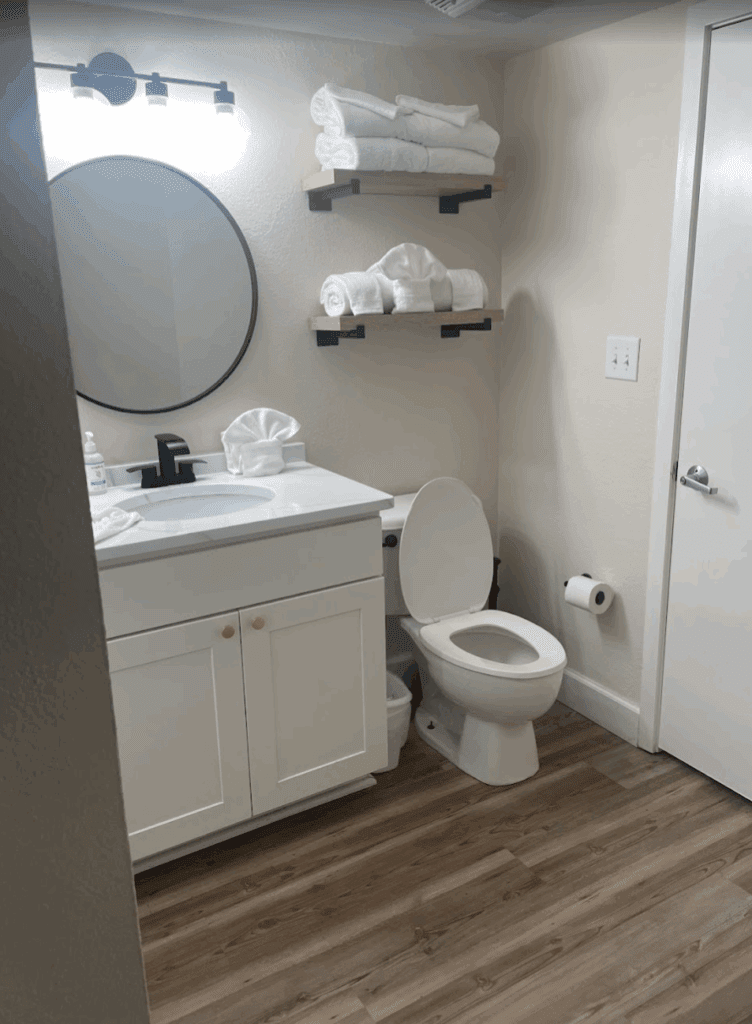 a bathroom with a toilet and sink