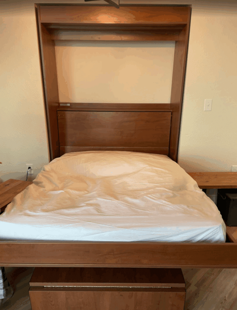a bed with a white sheet