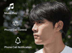 a man wearing a bluetooth earpiece