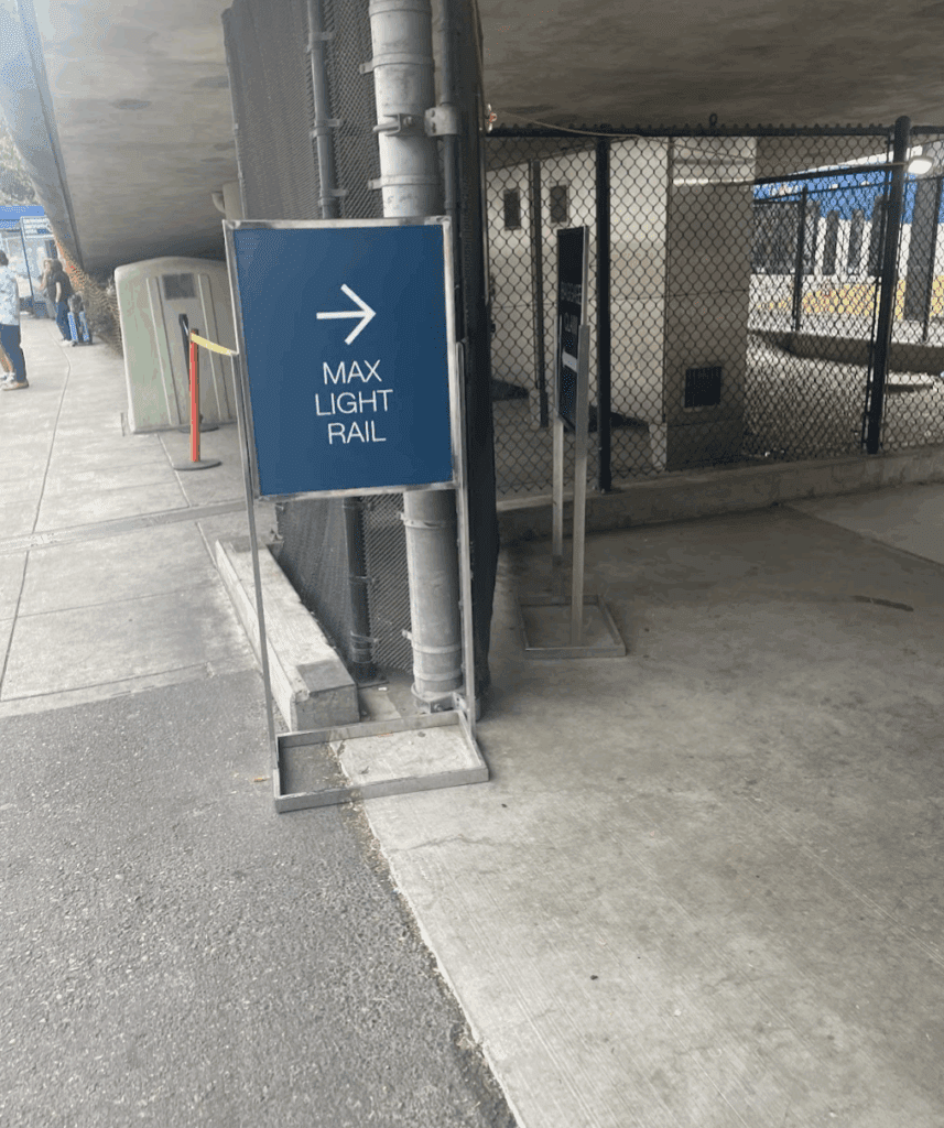 a sign on a sidewalk