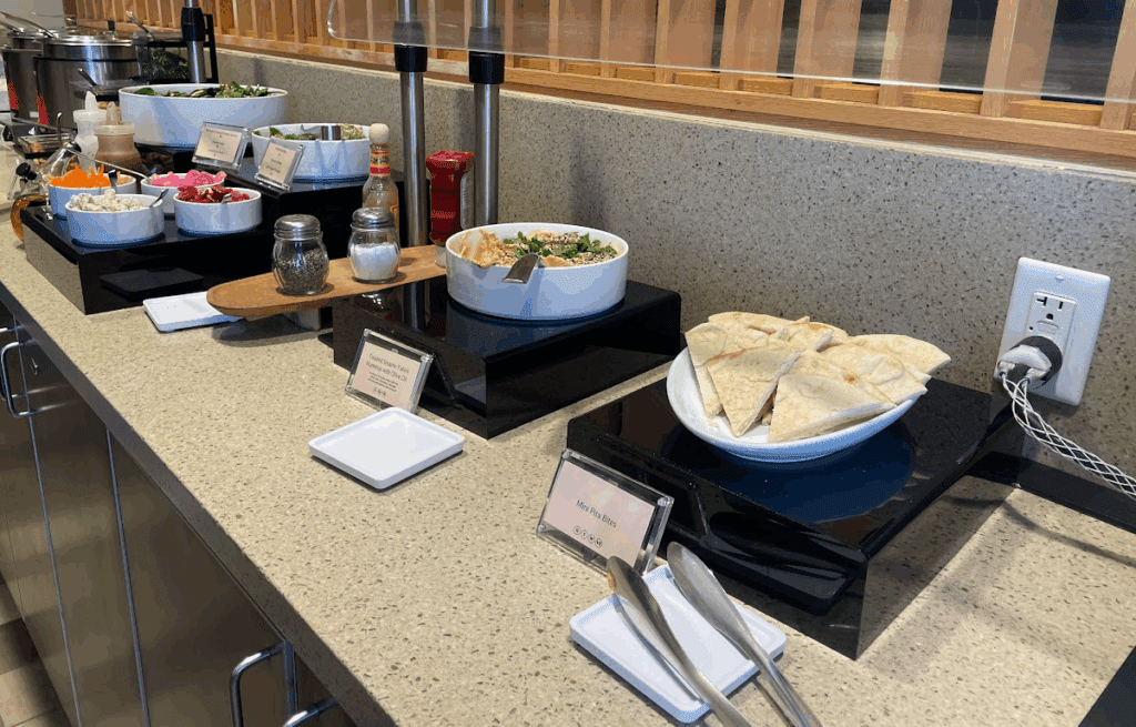 a buffet table with food on it
