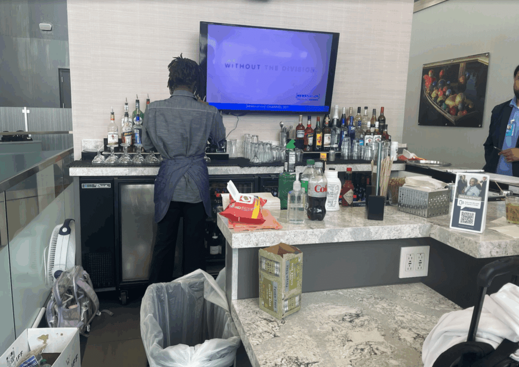 a man standing at a bar